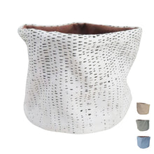 Baski plant pot with protective layer